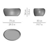 A low, oval, cement garden table Macklin