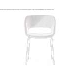 A chair upholstered in fabric with a sled base Kirec