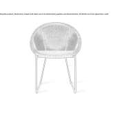 A wicker garden chair with a sleigh base and armrests Alcaniz