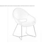 An armchair with a sled base, upholstered in fabric or leather Circa