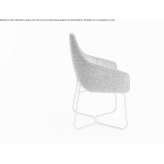 A chair upholstered in fabric with armrests on a sled base Tallinn