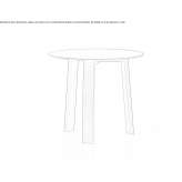 A low, round, wooden coffee table Licking