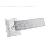 Brass door handle on a rosette Esporles